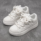 Suie, sneakers blanches à semelle épaisse